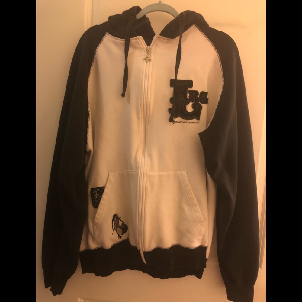 Hoodie jacket with silver-colored zippers.
